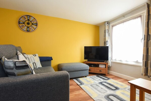 Comfortable lounge area with Smart TV