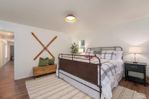 Primary Bedroom with slider to deck over looking the golf course