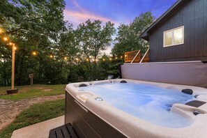 Unwind in your own private hot tub.  Set the mood with overhead string lights that can be turned on and off as you see fit.