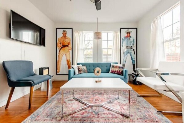 Cozy and stylish living room with Google Fiber internet and 43 inch Smart TV.