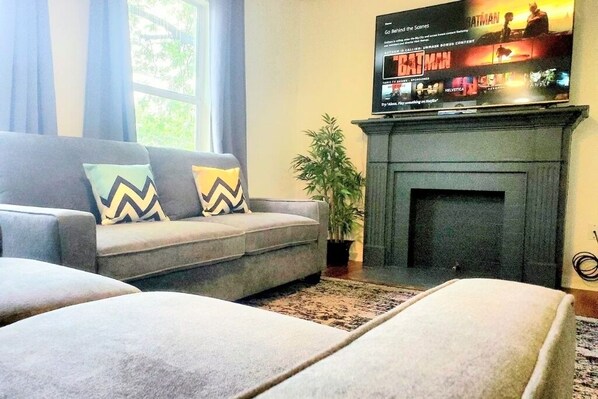 Enjoy comfort with television in our living room, perfect for relaxation and unwinding.