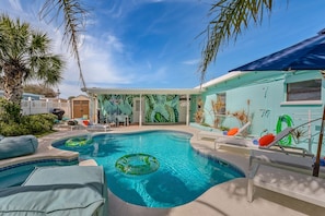 Grill and chill: Fire up the propane grill for a poolside family cookout.