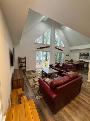 Living room with lake views and smart TV