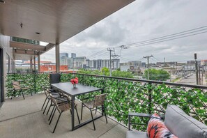 Outdoor Balcony · Outdoor Dining Set · Extra chairs · Two comfy lounge chairs · City views