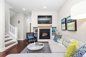 Comfy sectional and fireplace