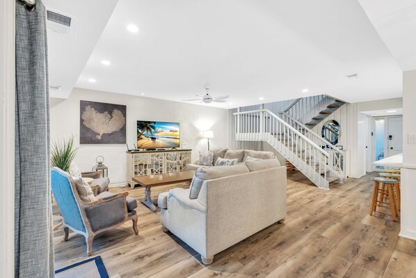 Immerse yourself in the finest traditions of Southern living at our villa, where relaxation and entertainment await in a bright and airy interior adorned with upscale furnishings.