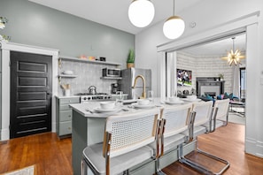 The kitchen on the first floor has stainless steel appliances. (1st Floor)