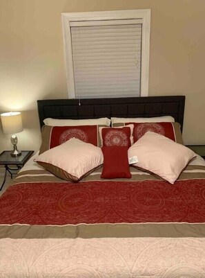 Master bedroom California King size bed