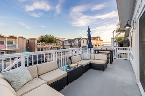 Upper deck features a spacious sectional.