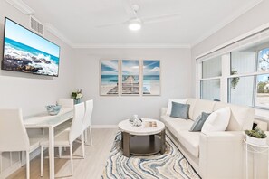Living room, dining for four and HDTV