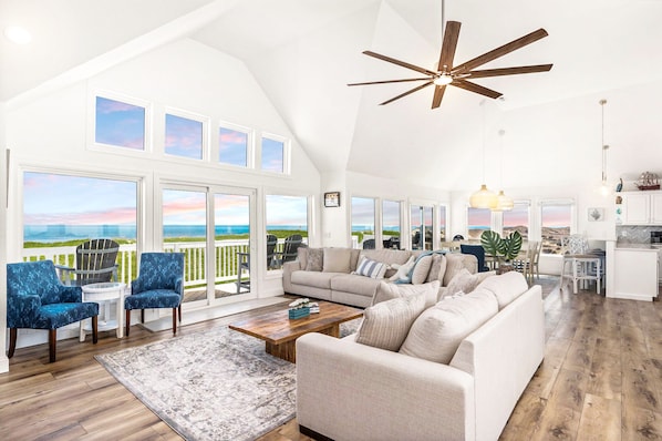 Relax and unwind with stunning panoramic beach views right from the comfort of your living room.