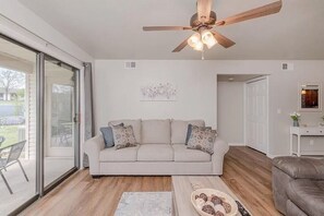Living room with access to back porch