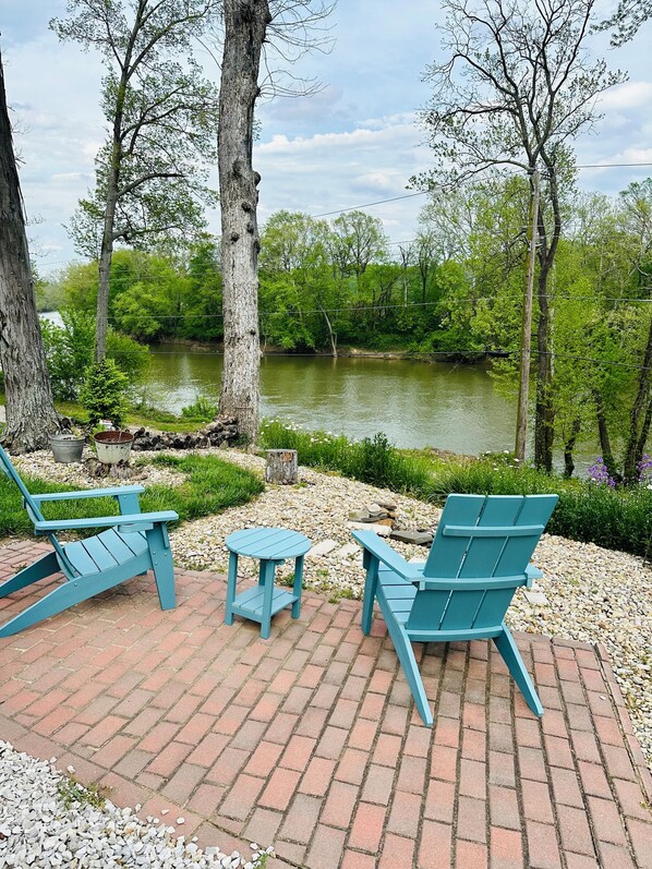 Outdoor fire pit with river view