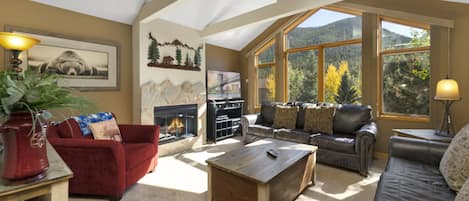 Cozy living room with large windows for some amazing views