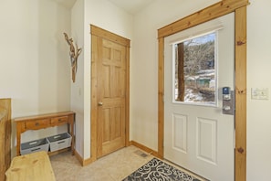 Front door into condo's entry room.