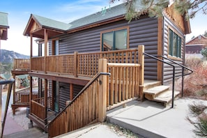 Exterior view with several stairs to unit.