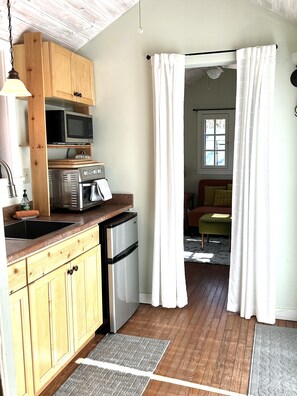 Kitchenette with basic appliances. 