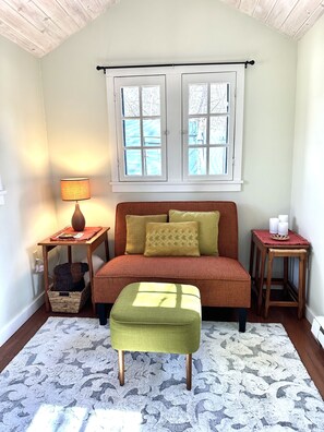 Living room space with desk and TV.