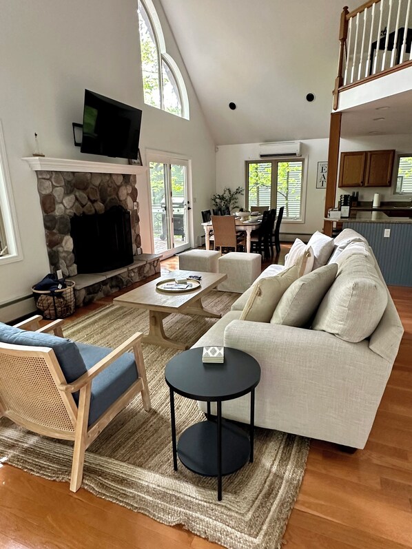 Spacious living room w/ natural light