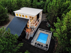 Secluded backyard with private heated pool, hot tub, swings, hammock, playset