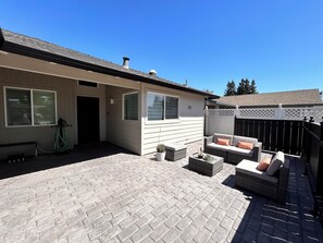 West facing front patio with seating - great for sunsets