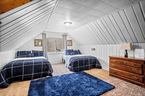 Bedroom # 3, 02 X Full size beds, clothing space,  smart T.V and work station. 
