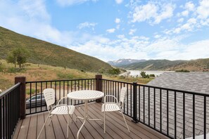 Upstairs balcony: stunning mt. and lake views, perfect for coffee or unwinding.
