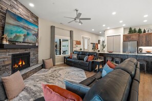 Embrace togetherness in our inviting space, where the living room, kitchen, and dining area seamlessly blend, allowing guests to stay in touch while relaxing on the sofas, cooking, or dining.
