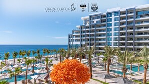Oceanfront luxury at Garza Blanca Cabo with pools and lush gardens.