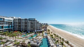 Beachfront luxury at Garza Blanca Cabo with stunning ocean and pool views.