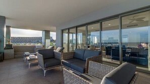 Private terrace with elegant furniture and hammock