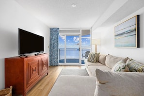 If the view isn't too much of a distraction, gather your crew for a movie night on the soft, comfy, giant couch.