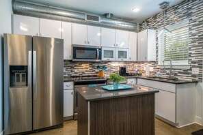 Modern Kitchen Stocked w/ Supplies