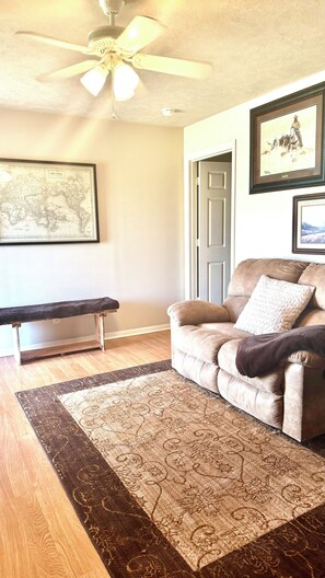 Entry living space, bench to kick your shoes off.