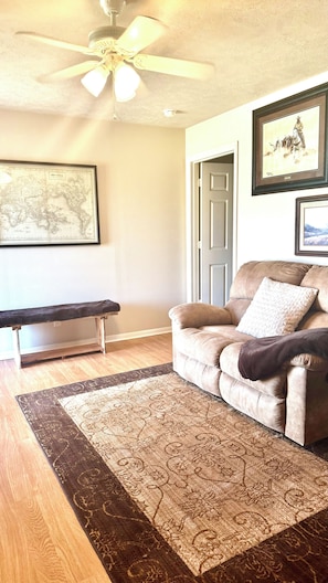Entry living space, bench to kick your shoes off.