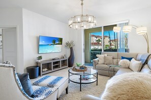 Step into our living room to unwind on our flat screen tv