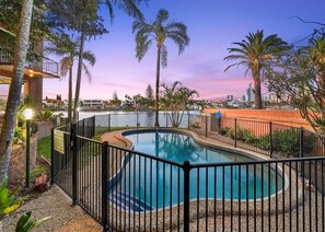 Return home after a day of sightseeing to take a refreshing dip in the building’s shared pool. 
