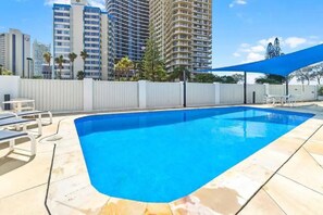 Dive into relaxation at the inviting shared pool, perfect for soaking up the sun and cooling off on warm days.