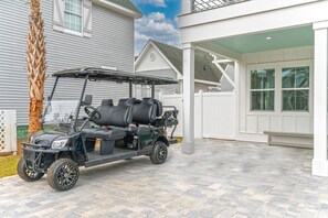 Includes golf cart, 2 paddleboards and 1 gas grill, propane included!