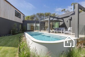 A decadent gas heated pool and spa for year round enjoyment