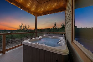 Find your bliss as you relax deeply in the hot tub.