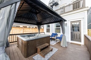 This home is complete with a hot tub, offering the ultimate vacation experience.