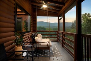 Enjoy a relaxing evening in the screened in porch, gently rocking on our swing bed.