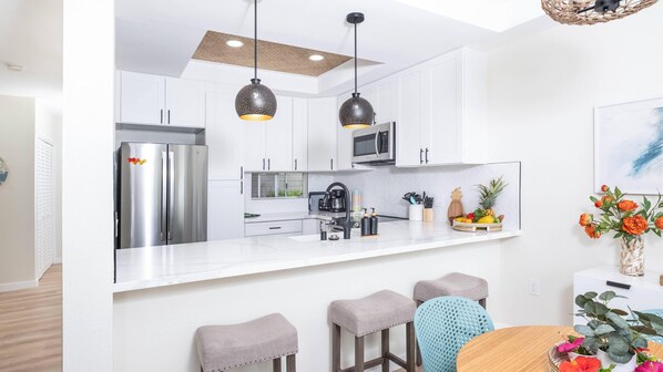 Kitchen with breakfast bar.