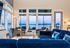 Curl Up on the Beautiful blue Sectional and Watch Your Favorite Movie or Show in the Living Room