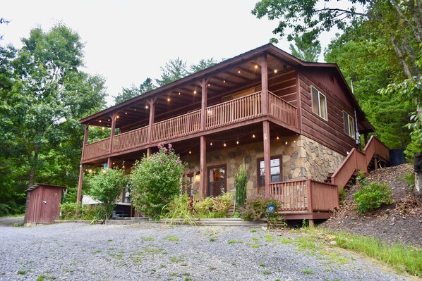 You'll love the privacy of this cabin perched above its very own vineyard.