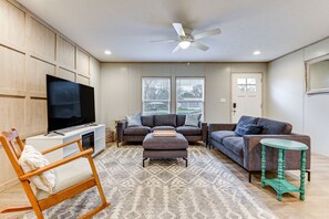 Living Room | Smart TV | Central Heating & A/C | Ceiling Fans | Board Games