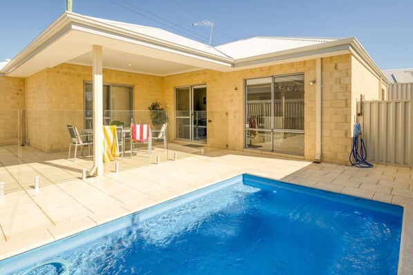 Make a splash in the large outdoor swimming pool. There are deck chairs for relaxing beneath the sunshine.
