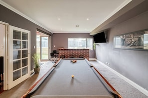 There’s plenty to keep the whole family busy with a dedicated games room and pool table.