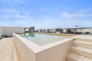 Stunning rooftop pools blending elegance and relaxation in Tulum.